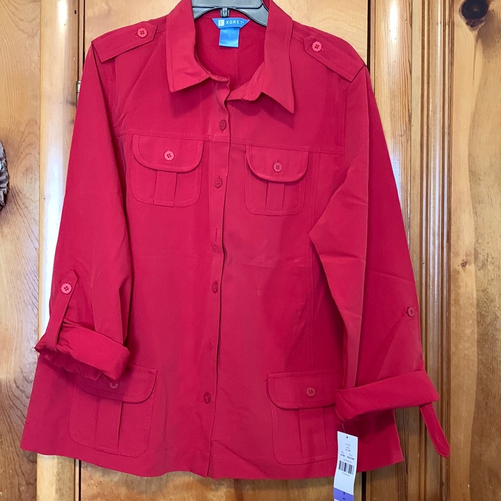 Ladies Long sleeve button up shirt New with Tags.  Size 18 Misses